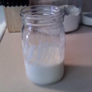 quart jar with water and flour mixed up