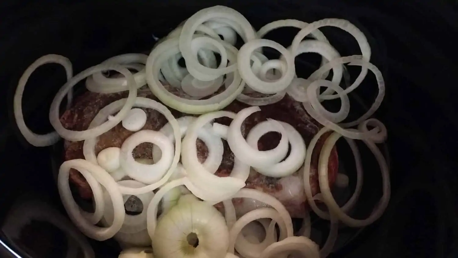 meat and onions for Crockpot Venison Goulash