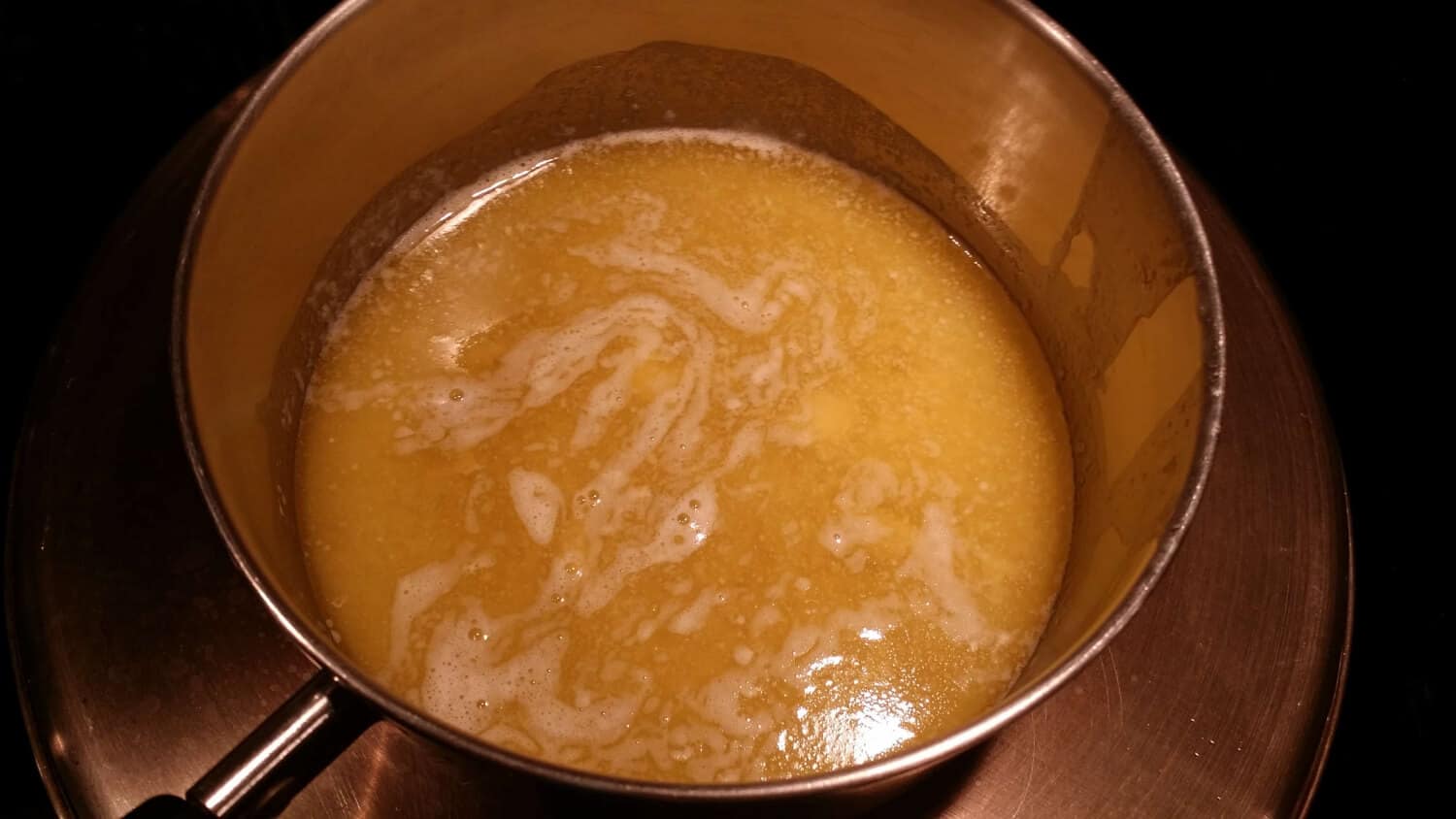 melting butter and honey for chocolate ganache
