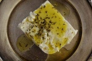 Homemade Feta Cheese on plate with olive oil