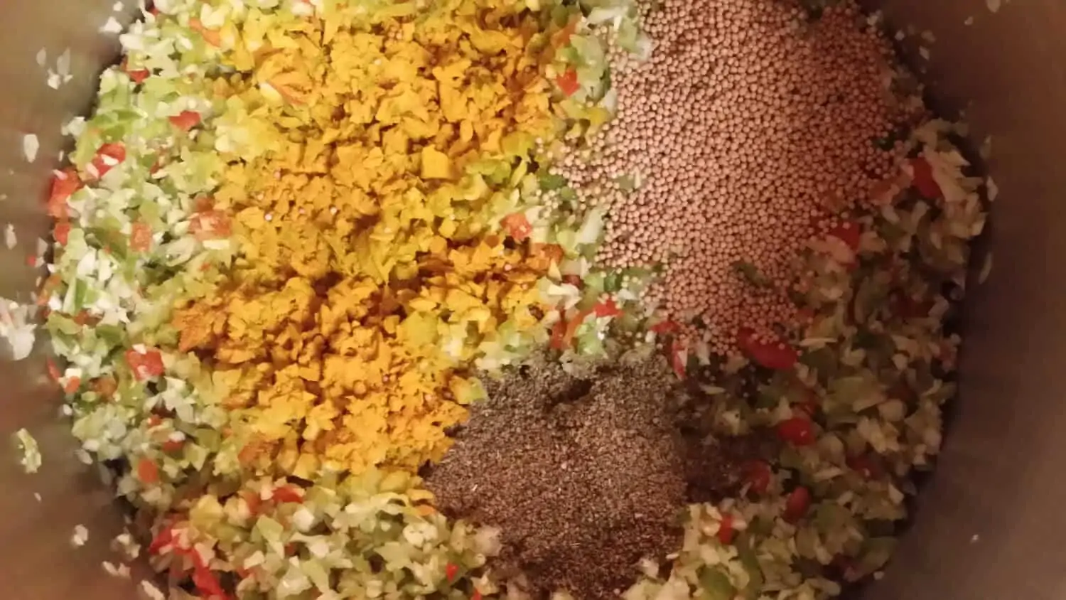 adding the spices to the sweet pickle relish