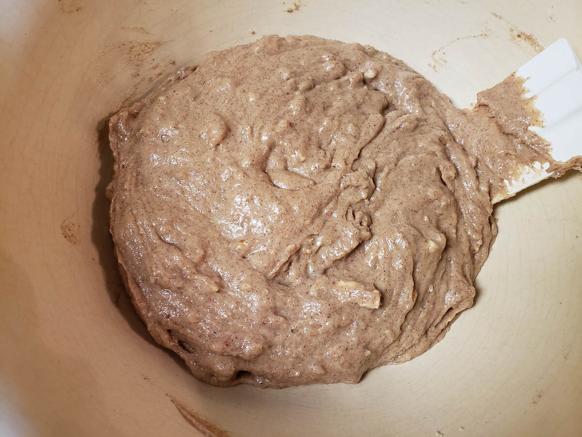 Sourdough Cinnamon Pecan Muffin batter in stoneware bowl