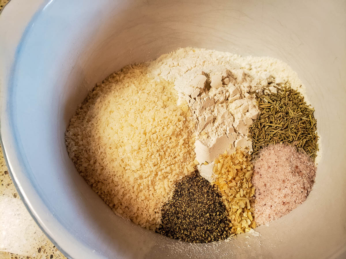 Ingredients for Parmesan Rosemary Breadsticks in white bowl